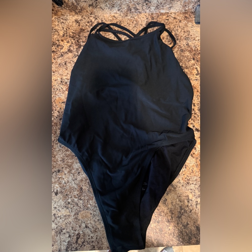 Jolyn Ryker One Piece Suit